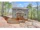 Charming gray two-story home featuring a cozy porch and set on a wooded lot at 176 Forest Creek Dr, Statesville, NC 28625