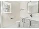 Modern bathroom features a sleek vanity, updated fixtures, and a window for natural light at 176 Forest Creek Dr, Statesville, NC 28625