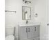 Modern bathroom features a sleek vanity, updated fixtures, and new lighting at 176 Forest Creek Dr, Statesville, NC 28625