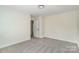 Bedroom with new carpet and access to en suite bathroom at 176 Forest Creek Dr, Statesville, NC 28625