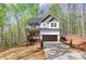 Two-story home boasts a well-manicured lawn and a two-car garage at 176 Forest Creek Dr, Statesville, NC 28625