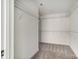 Empty walk-in closet includes metal shelving at 176 Forest Creek Dr, Statesville, NC 28625