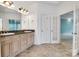 Elegant bathroom with double vanity, granite countertops, and stylish tile flooring at 18618 Rollingdale Ln, Davidson, NC 28036
