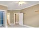 Spacious bedroom with access to the ensuite bathroom and closet space at 18618 Rollingdale Ln, Davidson, NC 28036