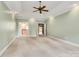 Spacious main bedroom boasts a tray ceiling, ceiling fan, and neutral tones at 18618 Rollingdale Ln, Davidson, NC 28036