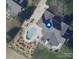 Aerial view of home with in-ground pool, patio, and landscaping at 1901 Benjamin Dr, Salisbury, NC 28146