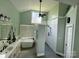 Stylish bathroom with a freestanding tub, walk-in shower, double vanity and serene green walls at 1901 Benjamin Dr, Salisbury, NC 28146