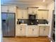 Elegant kitchen featuring stainless steel appliances, granite countertops, and ample cabinet space at 1901 Benjamin Dr, Salisbury, NC 28146