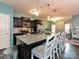 Modern kitchen features stainless steel appliances, granite countertops, and a spacious center island at 20025 Metaphor Mews None, Davidson, NC 28036