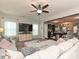 Open-concept living room seamlessly connected to a modern kitchen and dining area at 20025 Metaphor Mews None, Davidson, NC 28036