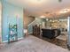 Open-concept living space with views of the staircase, kitchen, and stylish decor at 20025 Metaphor Mews None, Davidson, NC 28036