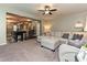 Stylish living room with a large sectional couch offering plenty of seating, connecting with kitchen at 20025 Metaphor Mews None, Davidson, NC 28036