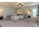 Comfortable living room with a large sectional couch and neutral decor at 20025 Metaphor Mews None, Davidson, NC 28036
