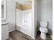 Clean bathroom with a shower/tub combination, neutral tile, and modern fixtures at 2035 Mauney Rd, Bessemer City, NC 28016