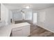 Bright open-concept kitchen boasts modern countertops and stainless appliances, perfect for cooking and entertaining at 2035 Mauney Rd, Bessemer City, NC 28016