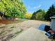 Large backyard with a wooden fence and deck at 213 Meadow Wind Ct, Monroe, NC 28110