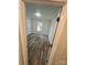 Cozy bedroom featuring modern flooring, a window, and a convenient closet at 213 Meadow Wind Ct, Monroe, NC 28110