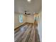 Large living room featuring hardwood floors and plenty of natural lighting at 213 Meadow Wind Ct, Monroe, NC 28110