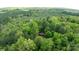Overhead view of the property, showcasing its location amidst a dense forest landscape at 2275 Brown Creek Church Rd, Wadesboro, NC 28170