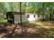Exterior of home with a covered area and ample yard space at 2275 Brown Creek Church Rd, Wadesboro, NC 28170