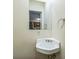 Cozy half bathroom with corner sink and stylish chrome fixtures at 266 Kelly St, Statesville, NC 28677