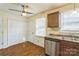 Functional kitchen space with updated stainless steel dishwasher and spacious storage at 266 Kelly St, Statesville, NC 28677