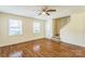 Inviting living room with hardwood floors, staircase, and natural light at 266 Kelly St, Statesville, NC 28677