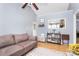 Cozy living room with vaulted ceiling, comfortable seating, and views into the kitchen at 2703 Plantation Way, Albemarle, NC 28001