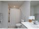 Bathroom featuring a toilet, shower with curtain and sink with vanity at 2932 Pirates Pl, Charlotte, NC 28216