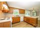 Traditional kitchen with durable countertops and wood-look flooring at 3005 Kenninghall Ct, Charlotte, NC 28269