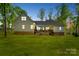 Stunning backyard with a well-manicured lawn and elegant exterior of the home at 358 Grassy Ridge Ct, Clover, SC 29710