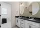 Bathroom featuring double vanities, matching framed mirrors, white cabinets and neutral wall color at 358 Grassy Ridge Ct, Clover, SC 29710