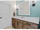 Bathroom vanity with double drawers, quartz countertop, updated light fixtures and a large framed mirror at 358 Grassy Ridge Ct, Clover, SC 29710