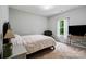 This bedroom has neutral walls, plush carpet, and a window with views to the outside at 358 Grassy Ridge Ct, Clover, SC 29710