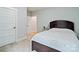 This bedroom boasts neutral walls, plush carpet, and a dark wood bed frame at 358 Grassy Ridge Ct, Clover, SC 29710
