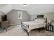 This bedroom has neutral walls, plush carpet, and a window with views to the outside at 358 Grassy Ridge Ct, Clover, SC 29710