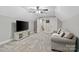 This bonus room has a ceiling fan, carpet and a couch at 358 Grassy Ridge Ct, Clover, SC 29710