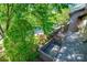 Balcony offering scenic views of lush greenery, the building's architectural details, and the surrounding neighborhood at 3625 Colony Crossing Dr, Charlotte, NC 28226
