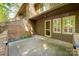 Covered patio with a concrete floor, brick walls and lots of natural light at 3625 Colony Crossing Dr, Charlotte, NC 28226