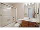 Functional bathroom featuring shower-tub combination and vanity at 3849 Carl Parmer Dr, Harrisburg, NC 28075