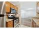 Kitchen with stainless steel appliances and granite countertops at 3849 Carl Parmer Dr, Harrisburg, NC 28075