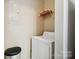 Small laundry area equipped with a washer and dryer at 3849 Carl Parmer Dr, Harrisburg, NC 28075