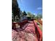 Inviting back porch and walkway with red wooden railings, offering outdoor living space at 402 California St, York, SC 29745