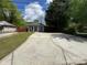 Charming single-story home with a well-maintained front yard, curb appeal, and large driveway at 402 California St, York, SC 29745