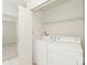 The well-lit laundry room with a washer and dryer at 415 Mather Green Ave # I, Charlotte, NC 28203