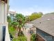 Aerial view of a community pool, landscaping, lounge chairs, patio, and tables at 415 Mather Green Ave # I, Charlotte, NC 28203