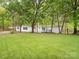 Charming single-story home with a well-maintained lawn and mature trees at 4757 Mountain View Ln, Maiden, NC 28650