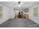 Open-concept living area and kitchen featuring an abundance of natural light and an easy flow for seamless living at 4757 Mountain View Ln, Maiden, NC 28650