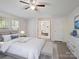 Comfortable main bedroom featuring a ceiling fan and an entrance to the main bathroom at 4757 Mountain View Ln, Maiden, NC 28650
