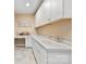 Stylish bar area features custom cabinets, a modern sink, and ample counter space at 4831 Looking Glass Trl, Denver, NC 28037